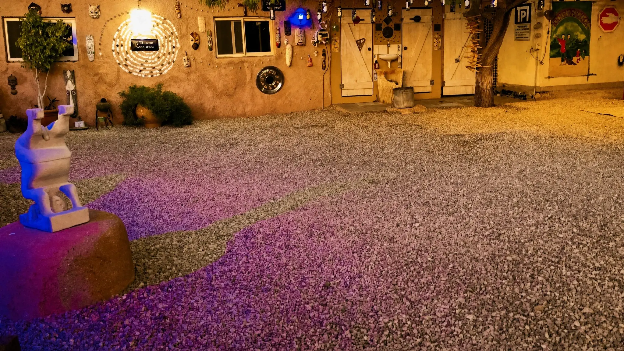 The yard at night, lit in color