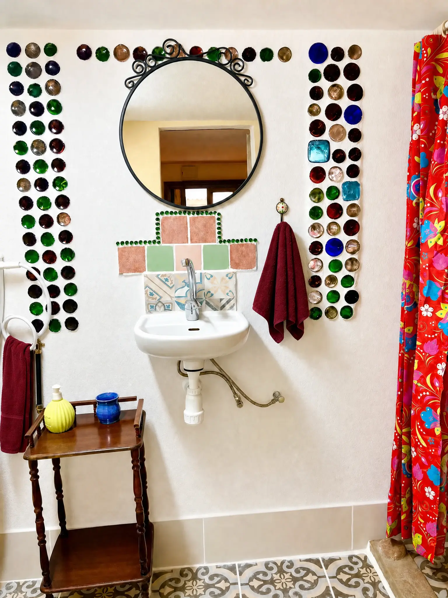 The sink in the Raz bathroom, between columns of colored bottle bottoms
