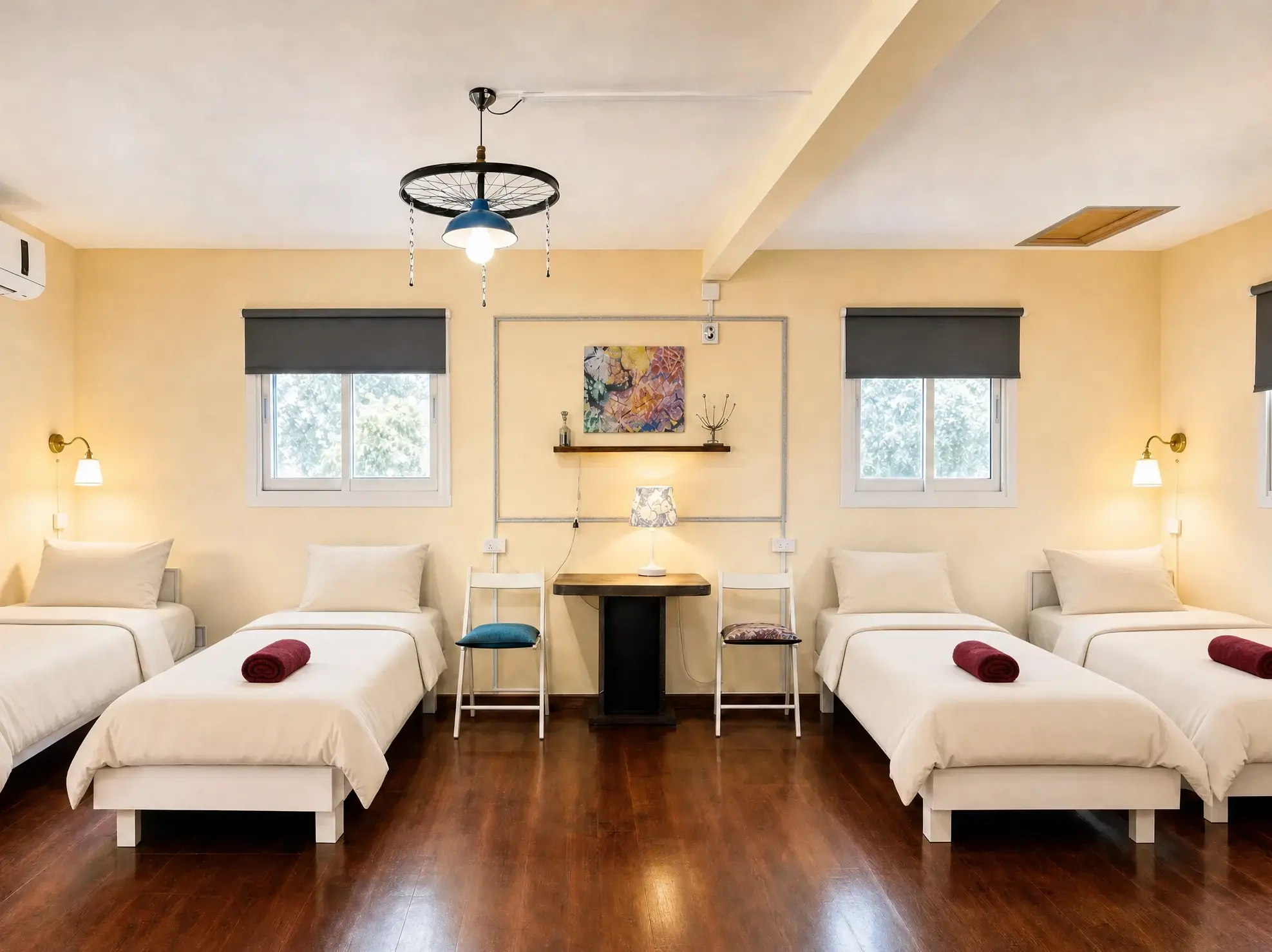 The Studio: four single beds and a large wooden floor