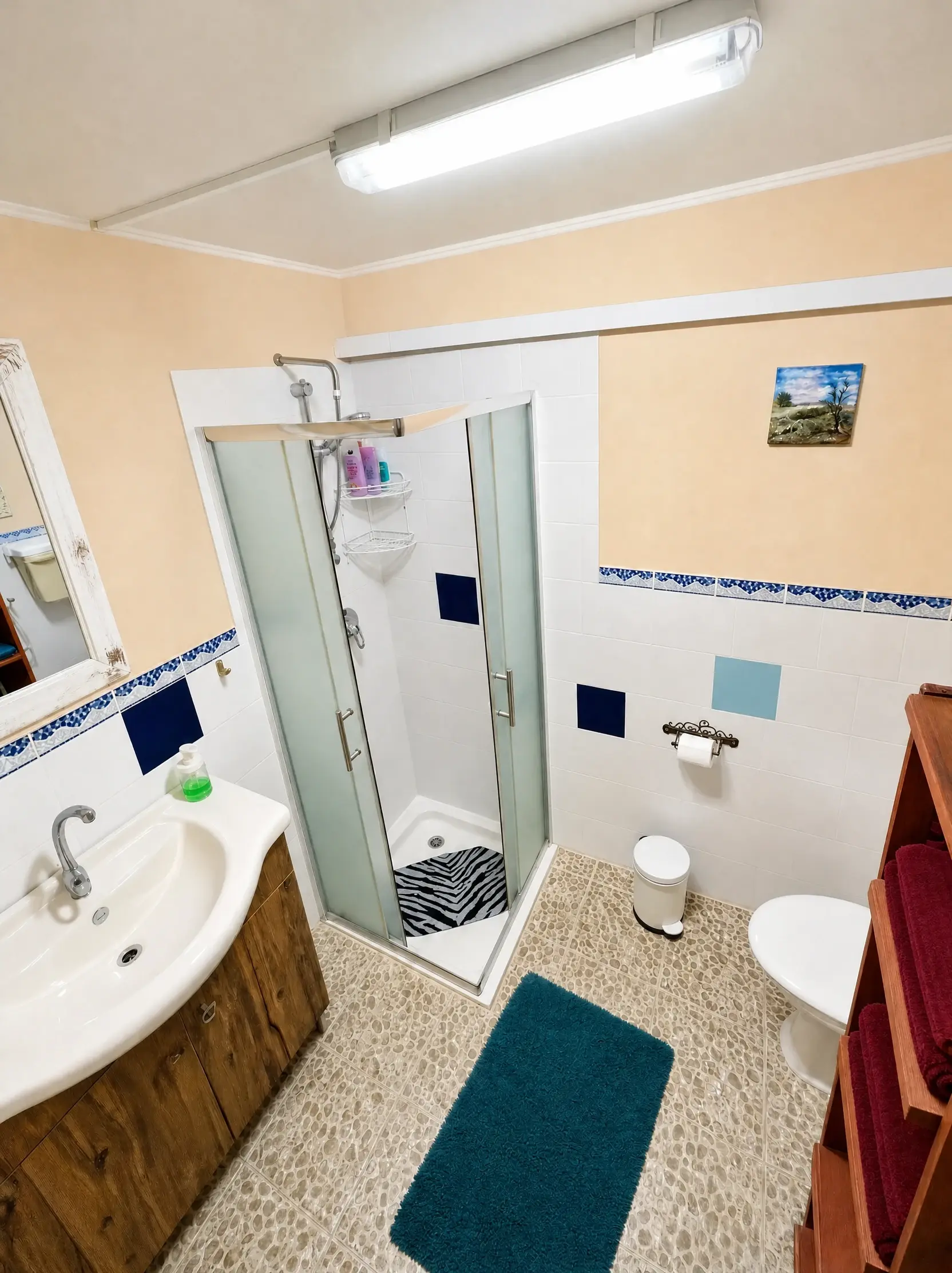 The shower and sink in the Studio bathroom