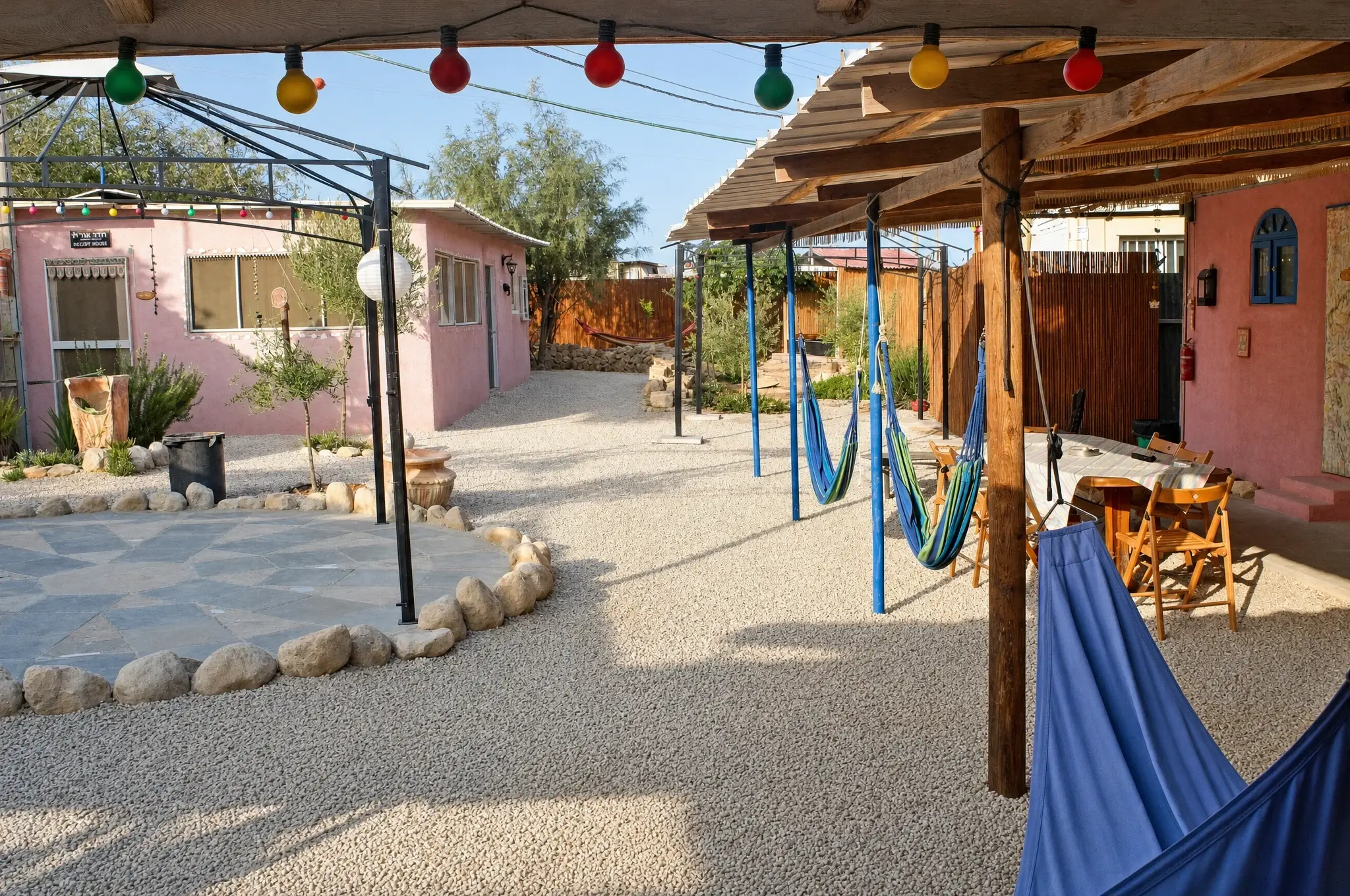 The yard: hammocks, string lights and sitting corners
